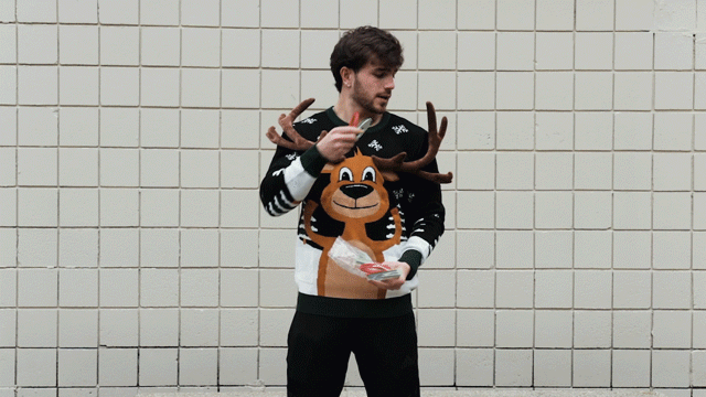 3D-Weihnachtspullover mit Rentier-Ringwurfmotiv