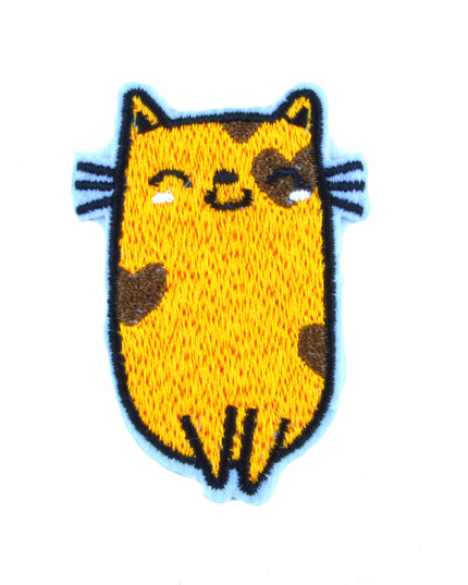 Patch – Lächelnde, mollige Katze