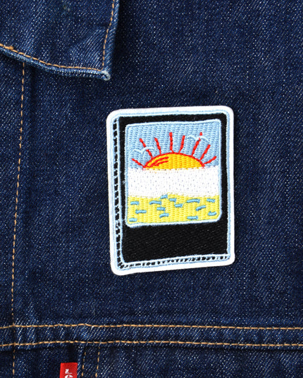 Patch – Zugfenster und Sonnenuntergang